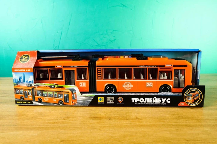 Детская игрушка троллейбус с подсветкой и звуковыми эффектами