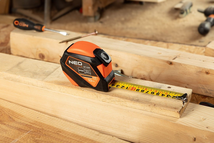 Рулетка NEO Tools сталева 10 м x 25 мм з автоматичним блокуванням, кнопкою зупинки та магнітом 67-235 (5907558472226) - зображення 8