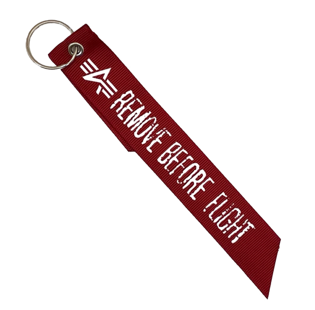 Красная лента Alpha Industries MA-1 REMOVE BEFORE FLIGHT |Брелок с кольцом для ключей - Фото 1 Красная лента Alpha Industries MA-1 REMOVE BEFORE FLIGHT |Брелок с кольцом для ключей - изображение 1
