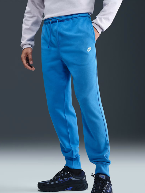 Spodnie dresowe męskie Nike M Nk Club Ft Jogger FN3801-435 XL Niebieskie (198481692835) - obraz 1