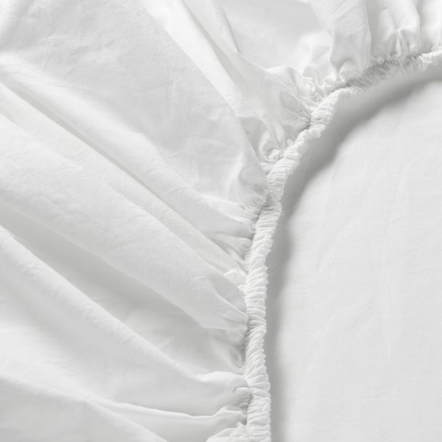 Prześcieradło Ikea Dvala z gumką bawełniane 180 x 200 cm Białe (503.565.64) - obraz 2