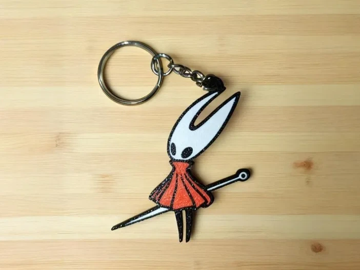 Брелок Hollow Knight Keyring Charm - Фото 1 Брелок Hollow Knight Keyring Charm - зображення 1