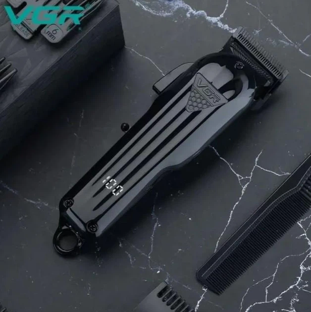 Тример VGR V-982 професійна машинка для стрижки волосся та бороди акумуляторна з LED дисплеєм 120 хв роботи 4 насадки роторний мотор - Фото 7 Тример VGR V-982 професійна машинка для стрижки волосся та бороди акумуляторна з LED дисплеєм 120 хв роботи 4 насадки роторний мотор - зображення 7