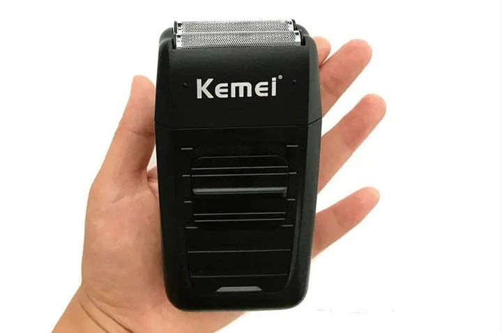 Електробритва Kemei роторна для догляду за обличчям і тілом з гіпоалергенною сіточкою для сухого гоління - зображення 11
