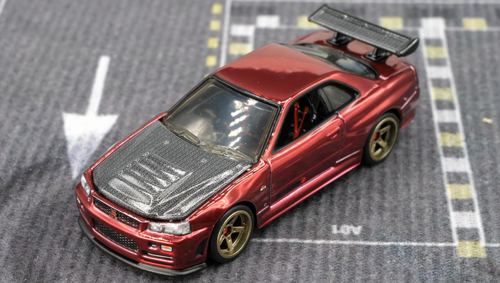 Машинка Premium Hot Wheels Nissan Skyline GT-R (BNR34) Red Line