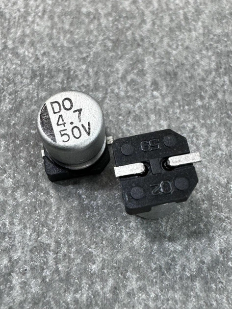 Конденсатор электролитический 4.7uf 50V,105C, (5x5) - Фото 1 Конденсатор электролитический 4.7uf 50V,105C, (5x5) - изображение 1