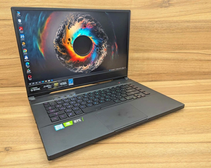 Ігровий ноутбук Asus Zephyrus S GX 502GW / 15,6" (1920x1080) IPS / Intel Core i7-9750H (6 (12) ядер по 2,6 - 4,5 ГГц) / 16 ГБ DDR4 / 1000 ГБ SSD / nVidia GeForce RTX 2070, 8 ГБ GDDR6, 256-біт / HDMI / Windows 10 б/в - Фото 4 Ігровий ноутбук Asus Zephyrus S GX 502GW / 15,6" (1920x1080) IPS / Intel Core i7-9750H (6 (12) ядер по 2,6 - 4,5 ГГц) / 16 ГБ DDR4 / 1000 ГБ SSD / nVidia GeForce RTX 2070, 8 ГБ GDDR6, 256-біт / HDMI / Windows 10 б/в - зображення 4
