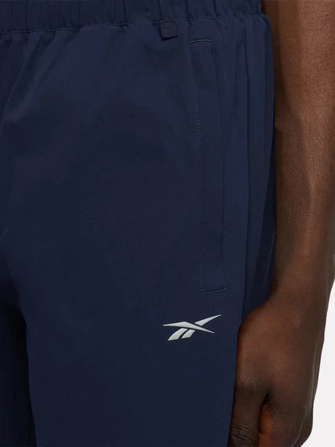 Спортивні штани чоловічі Reebok Desmond Slim Leg Training J 100242075 XL Темно-сині (1200179007865) - зображення 4