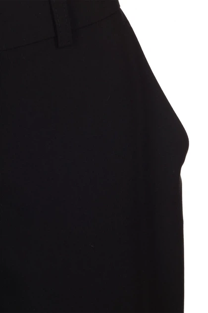 Жіночі брюки-банани з костюмної тканини LadyLike 42 Чорний (ll2216020090367) - зображення 2