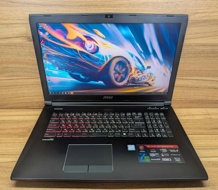 Ігровий ноутбук MSI GE72MVR / 17.3" (1920x1080) IPS / Intel Core i7-7700HQ (4 (8) ядра по 2.8 - 3.8 GHz) / 32 GB DDR4 / 256 GB SSD + 1000 GB HDD / nVidia GeForce GTX 1070, 8 GB GDDR5, 256-bit / WebCam / Windows 10 б/в - Фото 2 Ігровий ноутбук MSI GE72MVR / 17.3" (1920x1080) IPS / Intel Core i7-7700HQ (4 (8) ядра по 2.8 - 3.8 GHz) / 32 GB DDR4 / 256 GB SSD + 1000 GB HDD / nVidia GeForce GTX 1070, 8 GB GDDR5, 256-bit / WebCam / Windows 10 б/в - зображення 2