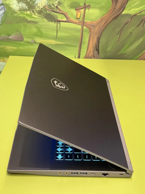 Ігровий ноутбук MSI Thin 15 B13vf / 15.6" (1920x1080) IPS / Intel Core i5-13420H (8 (12) ядер по 3,4 - 4,6 ГГц) / 16 ГБ DDR4 / 512 ГБ SSD / nVidia GeForce RTX 4060, 8 ГБ GDDR6, 128-bit / WebCam / HDMI б/в - Фото 7 Ігровий ноутбук MSI Thin 15 B13vf / 15.6" (1920x1080) IPS / Intel Core i5-13420H (8 (12) ядер по 3,4 - 4,6 ГГц) / 16 ГБ DDR4 / 512 ГБ SSD / nVidia GeForce RTX 4060, 8 ГБ GDDR6, 128-bit / WebCam / HDMI б/в - зображення 7