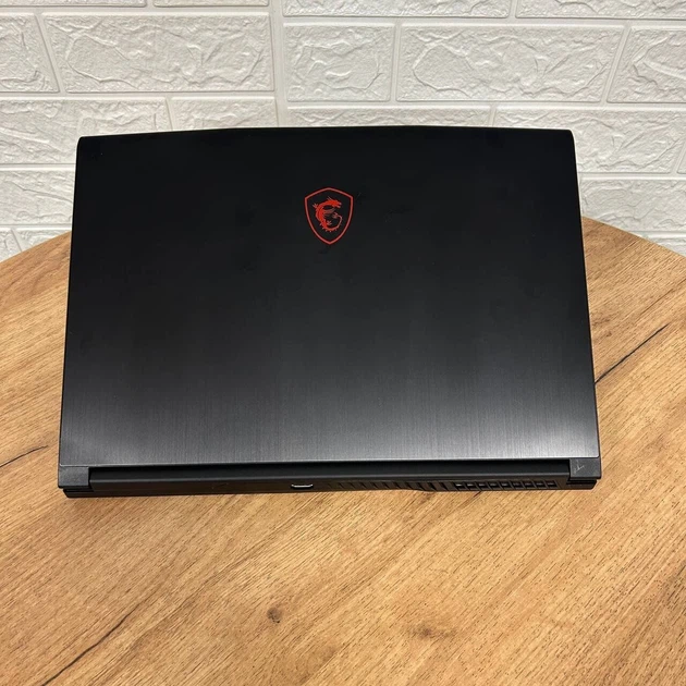 Ігровий ноутбук MSI GF63 Thin 8RC / 15.6" (1920x1080) IPS / Intel Core i7-8750H (6 (12) ядер по 2.2 - 4.1 GHz) / 8 GB DDR4 / 128 GB SSD + 1000 GB HDD / nVidia GeForce GTX 1050, 4 GB GDDR5, 128-bit / WebCam б/в - зображення 3