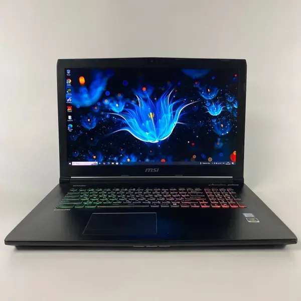 Мобильная рабочая станция Б-класс MSI WE72 7RJ / 17.3" (1920x1080) IPS / Intel Core i7-7700HQ (4 (8) ядра по 2.8 - 3.8 GHz) / 32 GB DDR4 / 512 GB SSD / nVidia Quadro M2200, 4 GB GDDR5, 128-bit / WebCam / HDMI б/у - Фото 2 Мобильная рабочая станция Б-класс MSI WE72 7RJ / 17.3" (1920x1080) IPS / Intel Core i7-7700HQ (4 (8) ядра по 2.8 - 3.8 GHz) / 32 GB DDR4 / 512 GB SSD / nVidia Quadro M2200, 4 GB GDDR5, 128-bit / WebCam / HDMI б/у - изображение 2