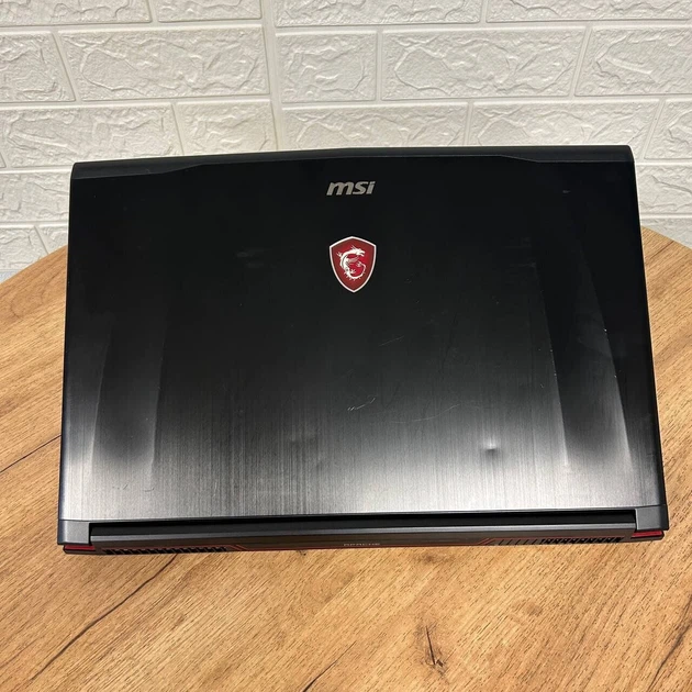 Игровой ноутбук Б-класс MSI GE72VR 7RF Apache Pro / 17.3" (1920x1080) TN / Intel Core i7-7700HQ (4 (8) ядра по 2.8 - 3.8 GHz) / 16 GB DDR4 / 128 GB SSD M.2 + 1000 GB HDD / nVidia GeForce GTX 1060, 3 GB GDDR5, 192-bit / WebCam б/у - Фото 3 Игровой ноутбук Б-класс MSI GE72VR 7RF Apache Pro / 17.3" (1920x1080) TN / Intel Core i7-7700HQ (4 (8) ядра по 2.8 - 3.8 GHz) / 16 GB DDR4 / 128 GB SSD M.2 + 1000 GB HDD / nVidia GeForce GTX 1060, 3 GB GDDR5, 192-bit / WebCam б/у - изображение 3