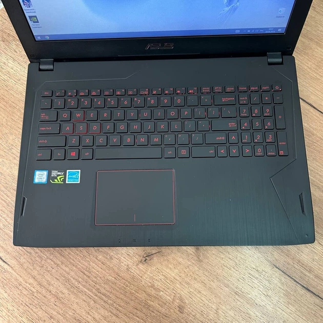 Игровой ноутбук Б-класс Asus FX502VMZ / 15.6" (1920x1080) IPS / Intel Core i7-7700HQ (4 (8) ядра по 2.8 - 3.8 GHz) / 8 GB DDR4 / 128 GB SSD + 1000 GB HDD / nVidia GeForce GTX 1060, 3 GB GDDR5, 192-bit / WebCam б/у - изображение 7
