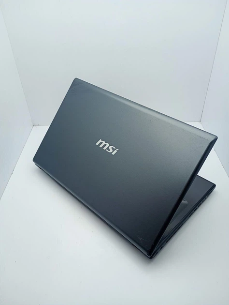 Ноутбук MSI CR70 / 17.3" (1600x900) TN / Intel Core i5-4310M (2 (4) ядра по 2.7 - 3.4 GHz) / 8 GB DDR3 / 1000 GB HDD / Intel HD Graphics 4600 / WebCam б/в - Фото 8 Ноутбук MSI CR70 / 17.3" (1600x900) TN / Intel Core i5-4310M (2 (4) ядра по 2.7 - 3.4 GHz) / 8 GB DDR3 / 1000 GB HDD / Intel HD Graphics 4600 / WebCam б/в - зображення 8