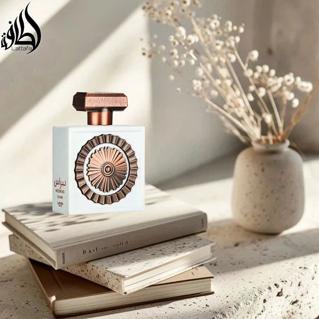 Парфюмированная вода унисекс Lattafa Perfumes Nebras Elixir 100 мл - Фото 4 Парфюмированная вода унисекс Lattafa Perfumes Nebras Elixir 100 мл - изображение 4