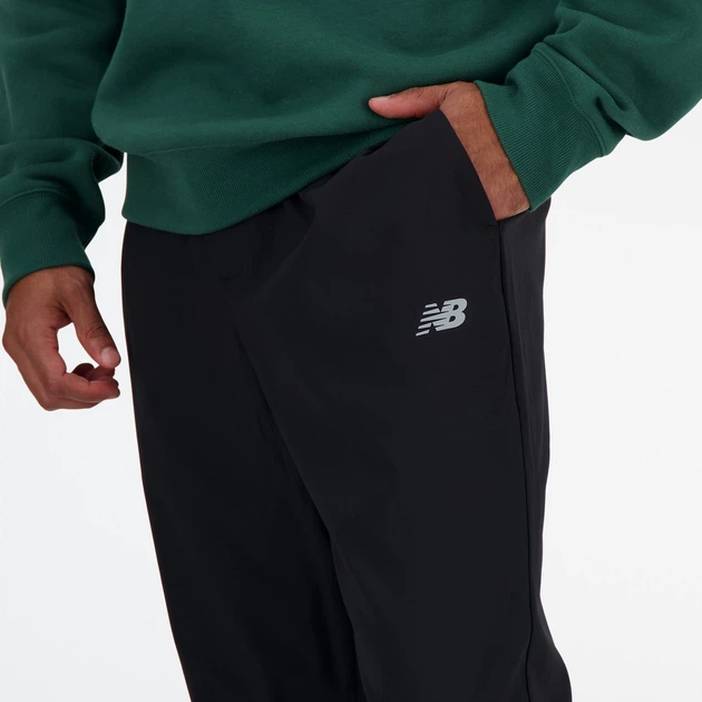 Мужские черные спортивные брюки New Balance AC Stetch Woven 52 (XL) (MP41060BK) - Фото 6 Мужские черные спортивные брюки New Balance AC Stetch Woven 52 (XL) (MP41060BK) - изображение 6