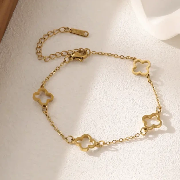 Браслет Van Cleef квіти без каменю золотого кольору - Фото 1 Браслет Van Cleef квіти без каменю золотого кольору - зображення 1