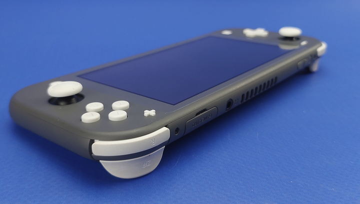 Консоль Nintendo Switch Lite 32GB (045496452650) Grey - Фото 3 Консоль Nintendo Switch Lite 32GB (045496452650) Grey - изображение 3