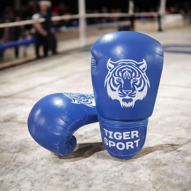 Боксерські рукавички Tiger Sport 12 oz сині вініл 151655 - Фото 2 Боксерські рукавички Tiger Sport 12 oz сині вініл 151655 - зображення 2