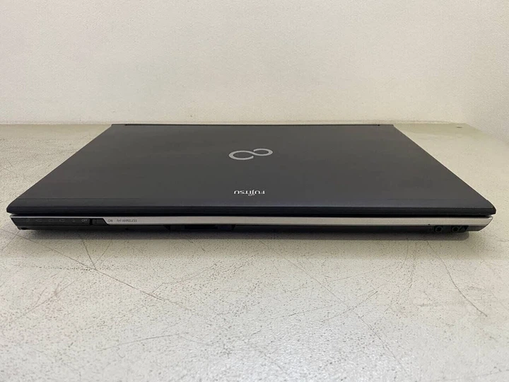 Мобільна робоча станція Б-клас Fujitsu Celsius H720 / 15.6" (1920x1080) TN / Intel Core i7-3720QM (4 (8) ядра по 2.6 - 3.6 GHz) / 16 GB DDR3 / 128 GB SSD / nVidia Quadro K1000M, 2 GB GDDR3, 128-bit / WebCam б/в - зображення 8