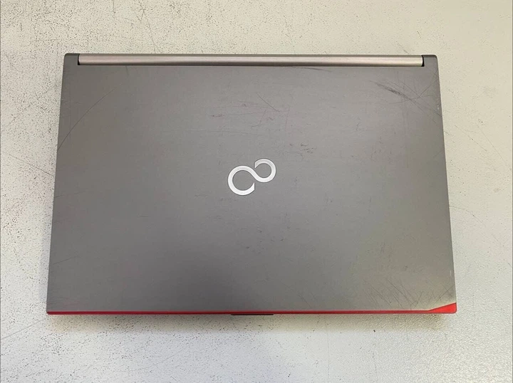 Мобільна робоча станція Fujitsu Celsius H730 / 15.6" (1920x1080) IPS / Intel Core i7-4800MQ (4 (8) ядра по 2,7 - 3,7 ГГц) / 16 ГБ DDR3 / 128 ГБ SSD / nVidia Quadro K1100M, 2 ГБ GDDR5, 128-біт / WebCam / DVD-ROM б/в - Фото 7 Мобільна робоча станція Fujitsu Celsius H730 / 15.6" (1920x1080) IPS / Intel Core i7-4800MQ (4 (8) ядра по 2,7 - 3,7 ГГц) / 16 ГБ DDR3 / 128 ГБ SSD / nVidia Quadro K1100M, 2 ГБ GDDR5, 128-біт / WebCam / DVD-ROM б/в - зображення 7