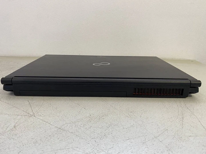 Мобільна робоча станція Б-клас Fujitsu Celsius H720 / 15.6" (1920x1080) TN / Intel Core i7-3720QM (4 (8) ядра по 2.6 - 3.6 GHz) / 16 GB DDR3 / 128 GB SSD / nVidia Quadro K1000M, 2 GB GDDR3, 128-bit / WebCam б/в - зображення 9
