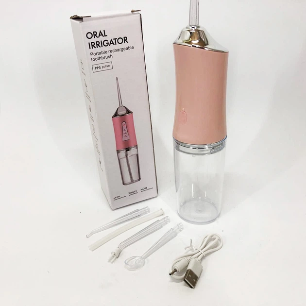 Ирригатор для чистки зубов и полости рта Oral Irrigator с аккумулятором и сменными насадками Pink - Фото 4 Ирригатор для чистки зубов и полости рта Oral Irrigator с аккумулятором и сменными насадками Pink - изображение 4