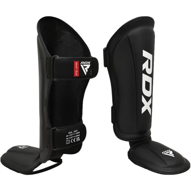 Захист Для Ніг RDX T1 Black Shin Instep Guards Чорний L (SGR-T1R-L) - Фото 1 Захист Для Ніг RDX T1 Black Shin Instep Guards Чорний L (SGR-T1R-L) - изображение 1