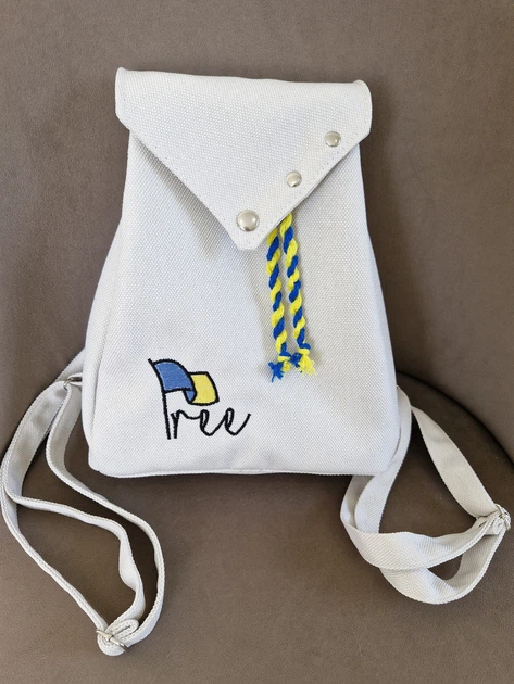 Міський рюкзак з машинною вишивкою синьо-жовтий напис Free 24*21*6 cм білий - Фото 2 Міський рюкзак з машинною вишивкою синьо-жовтий напис Free 24*21*6 cм білий - зображення 2