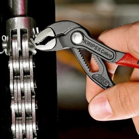 Сантехнические клещи KNIPEX Cobra 87 01 125 раскрытие губок до 27 мм Красный - Фото 2 Сантехнические клещи KNIPEX Cobra 87 01 125 раскрытие губок до 27 мм Красный - изображение 2