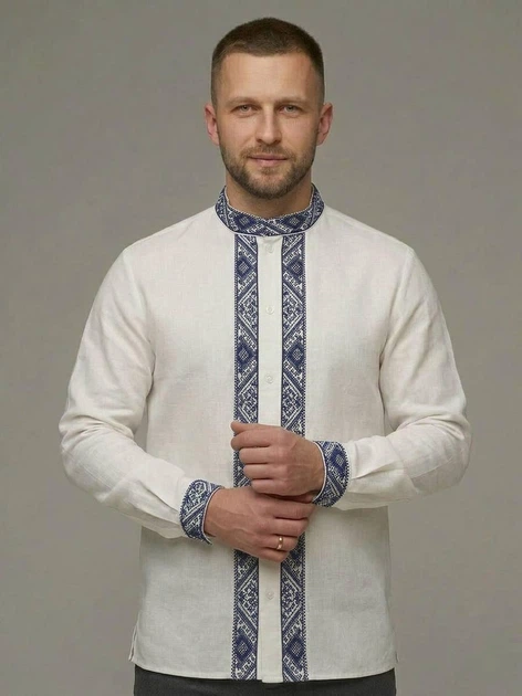 Вишиванка чоловіча MOTYV Тадей на ґудзиках Біла з синьою вишивкою льон/бавовна | Розмір L - Фото 1 Вишиванка чоловіча MOTYV Тадей на ґудзиках Біла з синьою вишивкою льон/бавовна | Розмір L - изображение 1