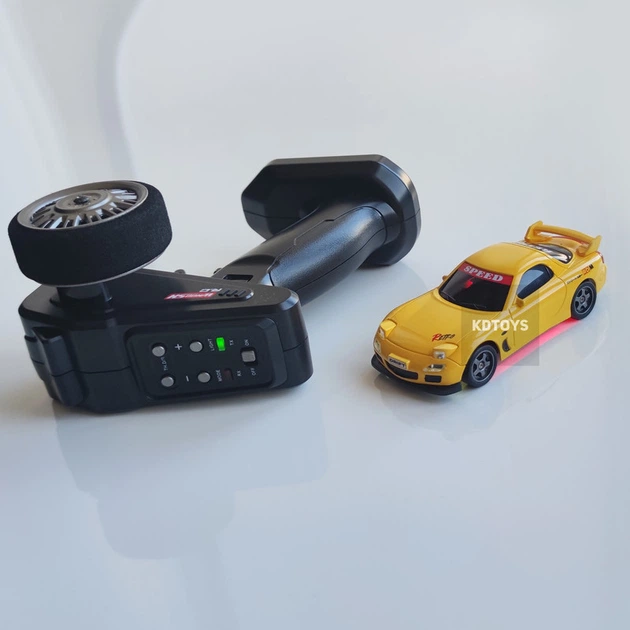 Дрифт машинка на радиоуправлении Mazda RX-7 Mini Drift 1:43, 4WD, до 15 км/ч, LED подсветка, USB зарядка, для дрифта (Желтый) - Фото 4 Дрифт машинка на радиоуправлении Mazda RX-7 Mini Drift 1:43, 4WD, до 15 км/ч, LED подсветка, USB зарядка, для дрифта (Желтый) - изображение 4