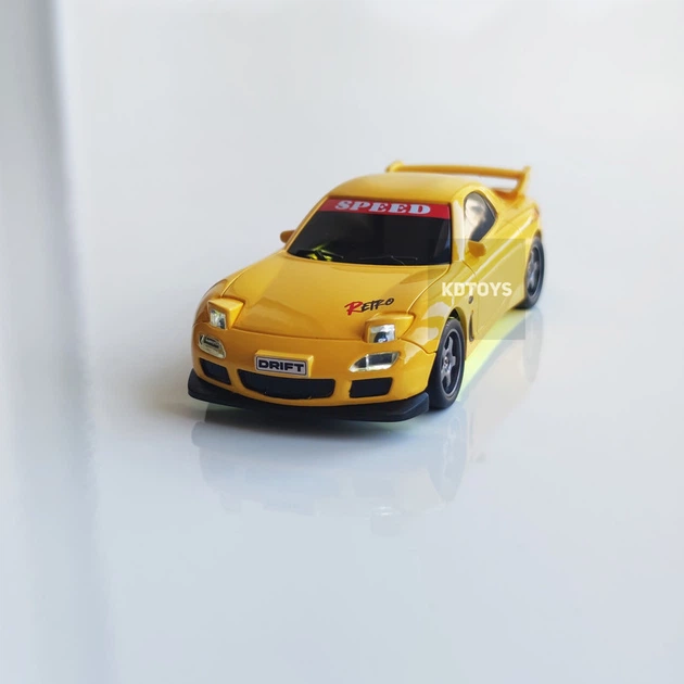 Дрифт машинка на радиоуправлении Mazda RX-7 Mini Drift 1:43, 4WD, до 15 км/ч, LED подсветка, USB зарядка, для дрифта (Желтый) - Фото 7 Дрифт машинка на радиоуправлении Mazda RX-7 Mini Drift 1:43, 4WD, до 15 км/ч, LED подсветка, USB зарядка, для дрифта (Желтый) - изображение 7