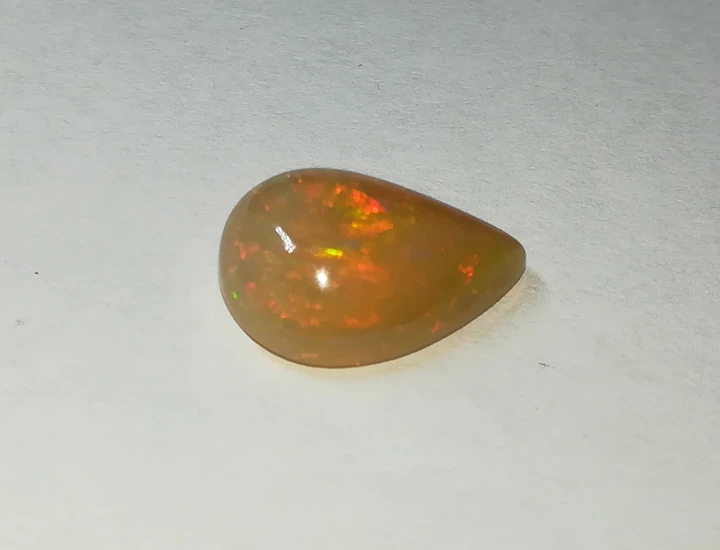Ефіопський опал кабашон 2.50Ct 12.77 x 9.36 x 5.12 mm (105296) - Фото 3 Ефіопський опал кабашон 2.50Ct 12.77 x 9.36 x 5.12 mm (105296) - зображення 3