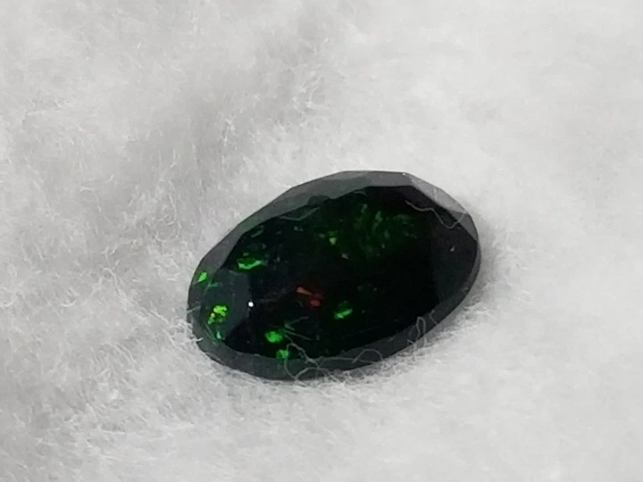 Черный опал 1.26 Ct 9.80 x 7.40 x 4.06 MM (38126) - изображение 7