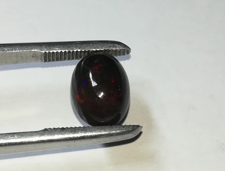 Эфиопский черный опал 3.44 Cts 12.51 X 9.32 mm (101450) - Фото 6 Эфиопский черный опал 3.44 Cts 12.51 X 9.32 mm (101450) - изображение 6
