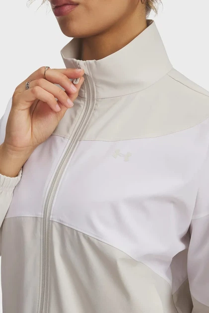 Жіноча біла вітровка UA Rival Woven Jacket Under Armour M 1389631-110 - Фото 2 Жіноча біла вітровка UA Rival Woven Jacket Under Armour M 1389631-110 - изображение 2