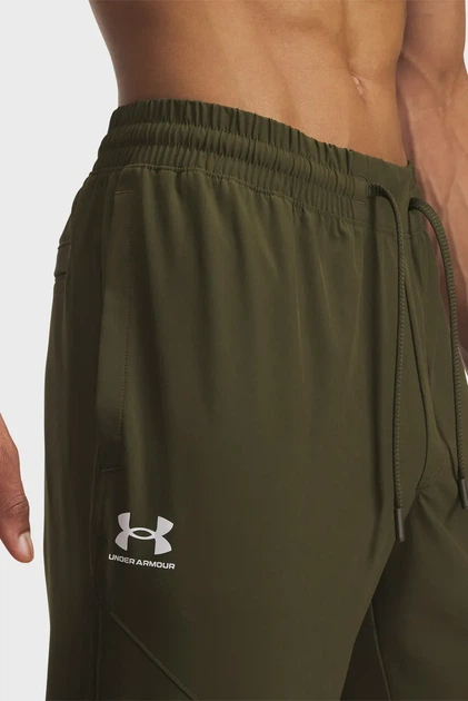 Чоловічі темно-зелені спортивні штани UA Vibe Woven Jogger Under Armour M 1386557-308 - Фото 4 Чоловічі темно-зелені спортивні штани UA Vibe Woven Jogger Under Armour M 1386557-308 - изображение 4