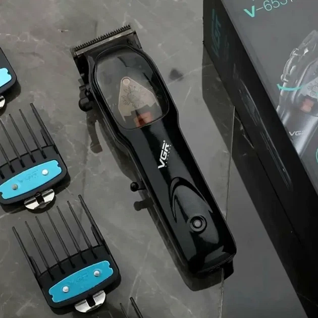 Аккумуляторная машинка для стрижки волос VGR V653 10 Вт 250 г USB керамические и титановые лезвия 4 насадки черный - изображение 2
