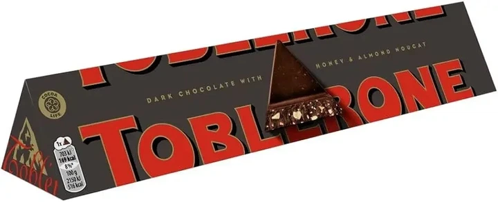 Шоколад Toblerone Dark з медово-мигдальною нугою 100 г - Фото 1 Шоколад Toblerone Dark з медово-мигдальною нугою 100 г - зображення 1