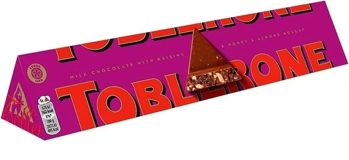 Молочный шоколад Toblerone с изюмом и медово-миндальной нугой 100 г - Фото 1 Молочный шоколад Toblerone с изюмом и медово-миндальной нугой 100 г - изображение 1