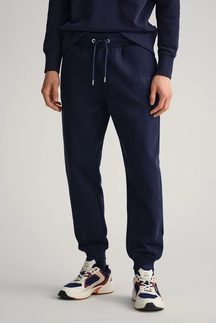 Чоловічі темно-сині спортивні штани TONAL ARCHIVE SHIELD PANTS Gant L 2039023 - Фото 1 Чоловічі темно-сині спортивні штани TONAL ARCHIVE SHIELD PANTS Gant L 2039023 - изображение 1