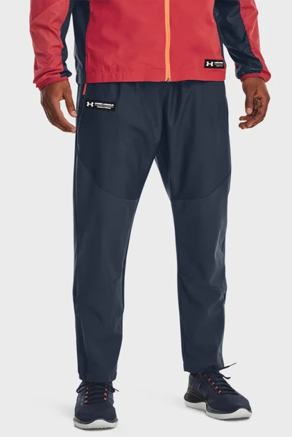 Чоловічі темно-сірі спортивні штани UA Rush Woven Pants Under Armour S 1377182-044 - Фото 1 Чоловічі темно-сірі спортивні штани UA Rush Woven Pants Under Armour S 1377182-044 - изображение 1