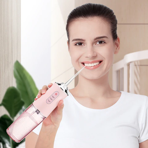 Ирригатор портативный Oral Irrigator 3 режима работы, 2 насадки - Фото 8 Ирригатор портативный Oral Irrigator 3 режима работы, 2 насадки - изображение 8