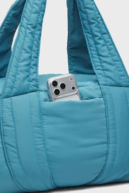 Жіноча блакитна спортивна сумка UA Studio Soft Duffle Under Armour OSFM 6009628-466 - Фото 5 Жіноча блакитна спортивна сумка UA Studio Soft Duffle Under Armour OSFM 6009628-466 - изображение 5