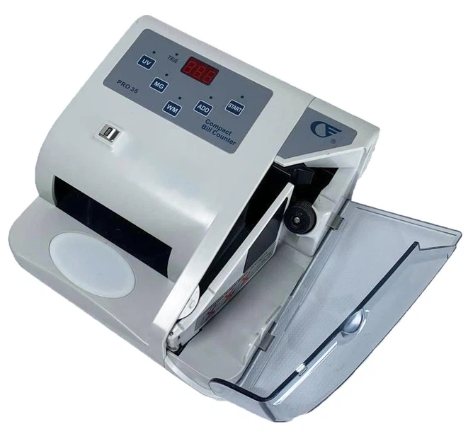 Счетная машинка PRO 35 с портативным детектором UV/MG для проверки купюр и подсчета банкнот Скоростной счётчик денег с функцией детекции подделок - Фото 4 Счетная машинка PRO 35 с портативным детектором UV/MG для проверки купюр и подсчета банкнот Скоростной счётчик денег с функцией детекции подделок - изображение 4