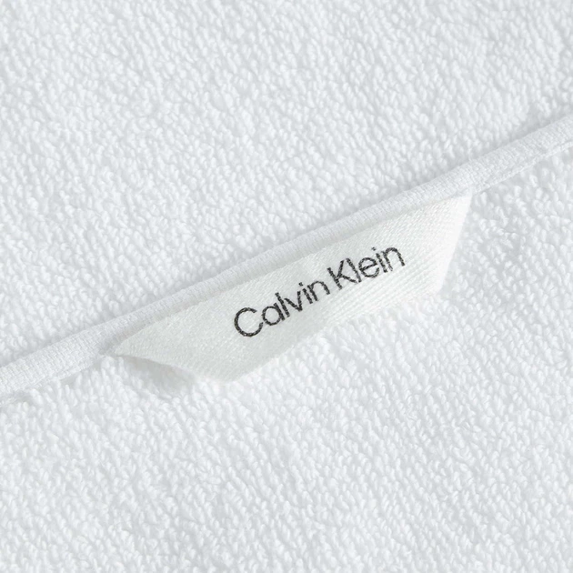 Calvin Klein махровые полотенца из плотного однотонного 100% хлопка с кантом (3 штуки – комплект для одного) – білий - изображение 3