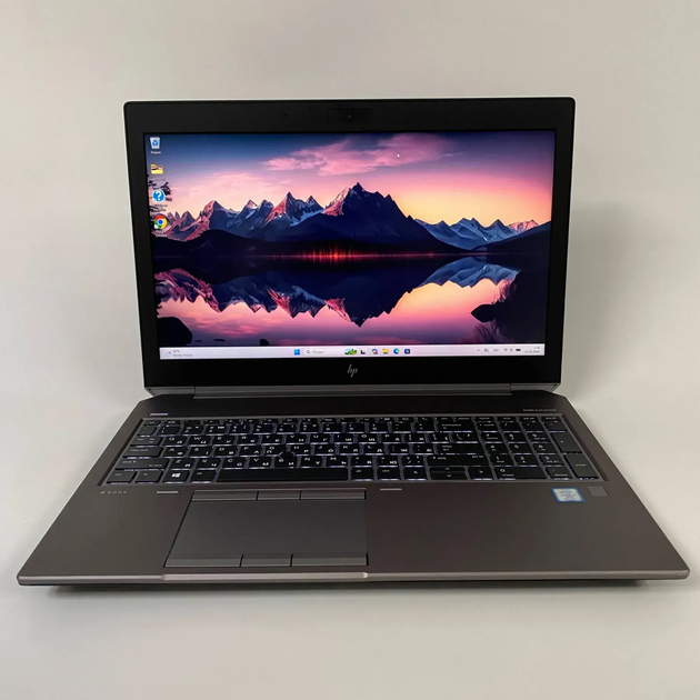 Мобільна робоча станція Б-клас HP ZBook 15 G5 / 15.6" (1920x1080) IPS / Intel Core i7-8850H (6 (12) ядра по 2.6 - 4.3 GHz) / 16 GB DDR4 / 240 GB SSD / nVidia Quadro P1000, 4 GB GDDR5, 256-bit / Fingerprint / WebCam б/в + Подарунок Бездротова миша / USB - зображення 2